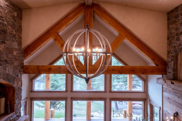 metal chandelier in cabin chic decorating