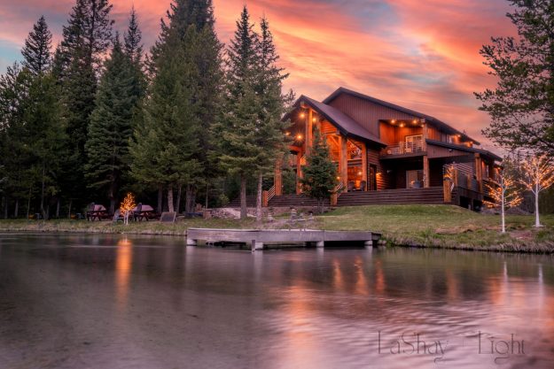 rustic dream house photography cabin by river with dramatic sunset