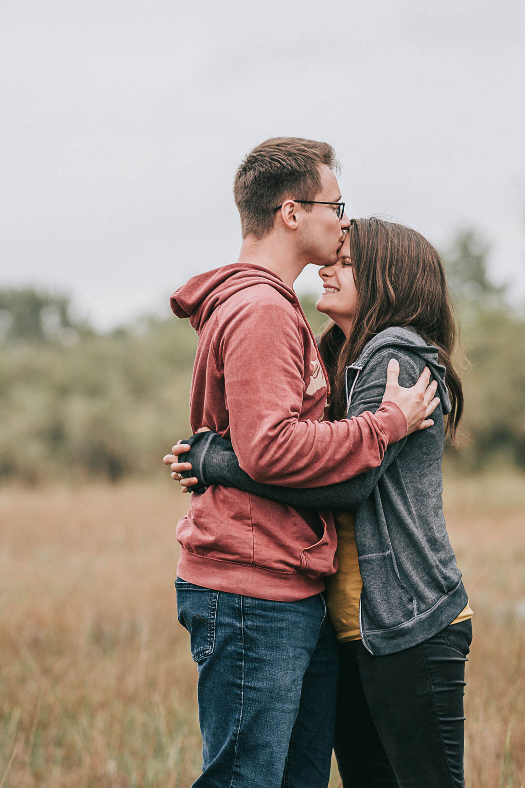 southeast idaho Engagement Photography man kissing fiance forehead