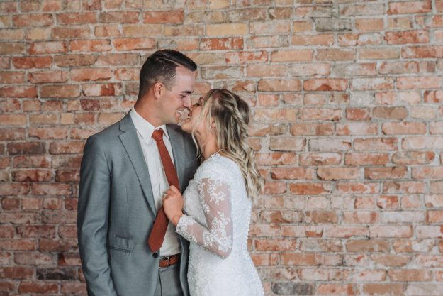 Bridals in Rigby bride and groom kissing