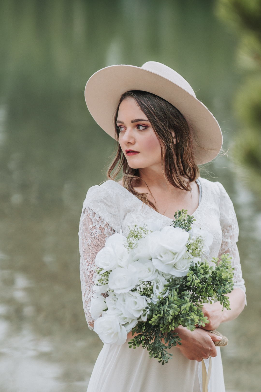 bridals bride holding bouquet at glacier national park