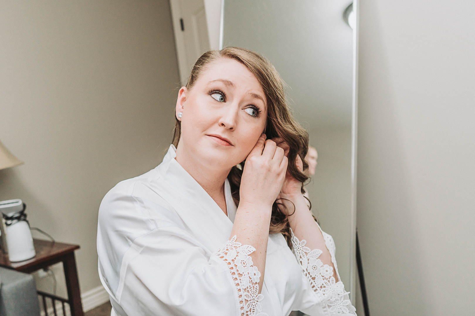 bride getting ready with 8 hours of wedding photography coverage