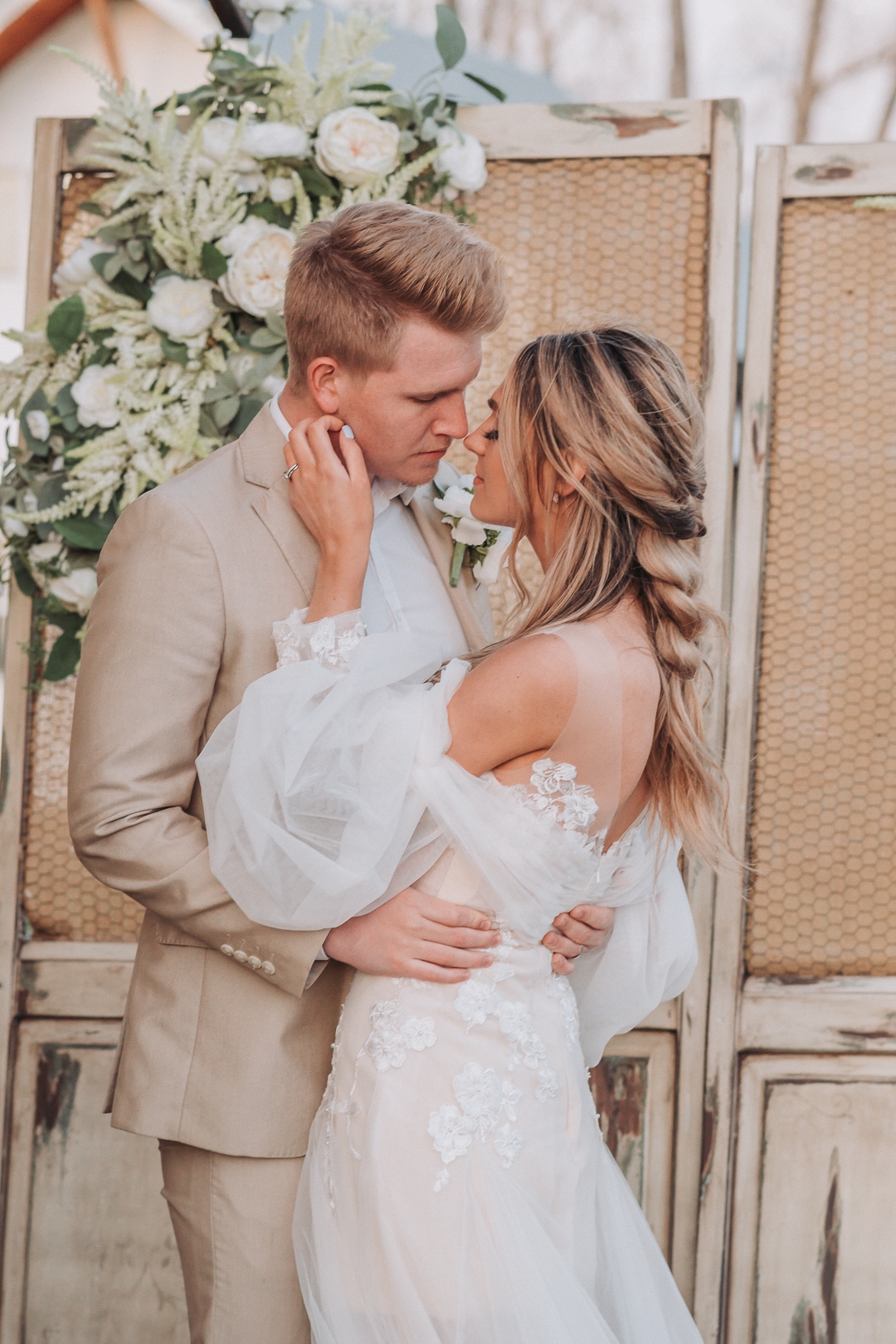 bride and groom about to kiss at bridals part of a 4 hour wedding