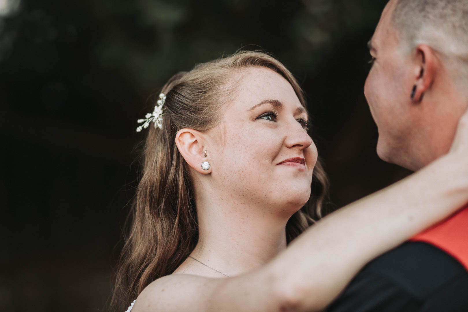 southeast wedding photographer bride looking at groom investment