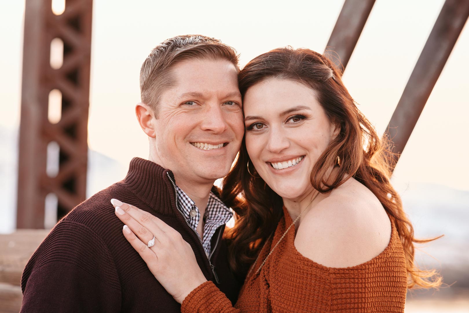 engagement couple smiling in photoshoot in idaho