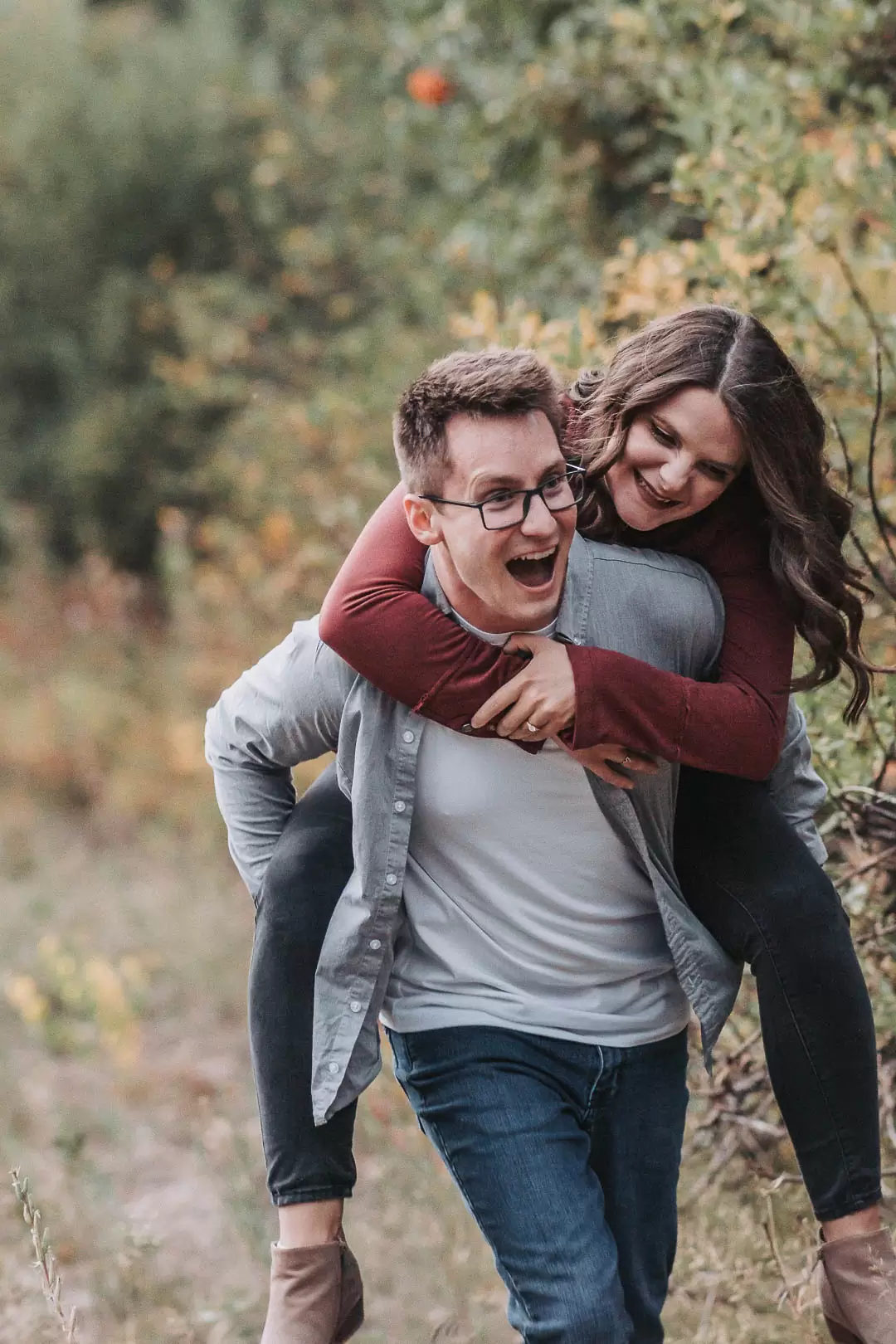 idaho falls date night idea couple piggybacking