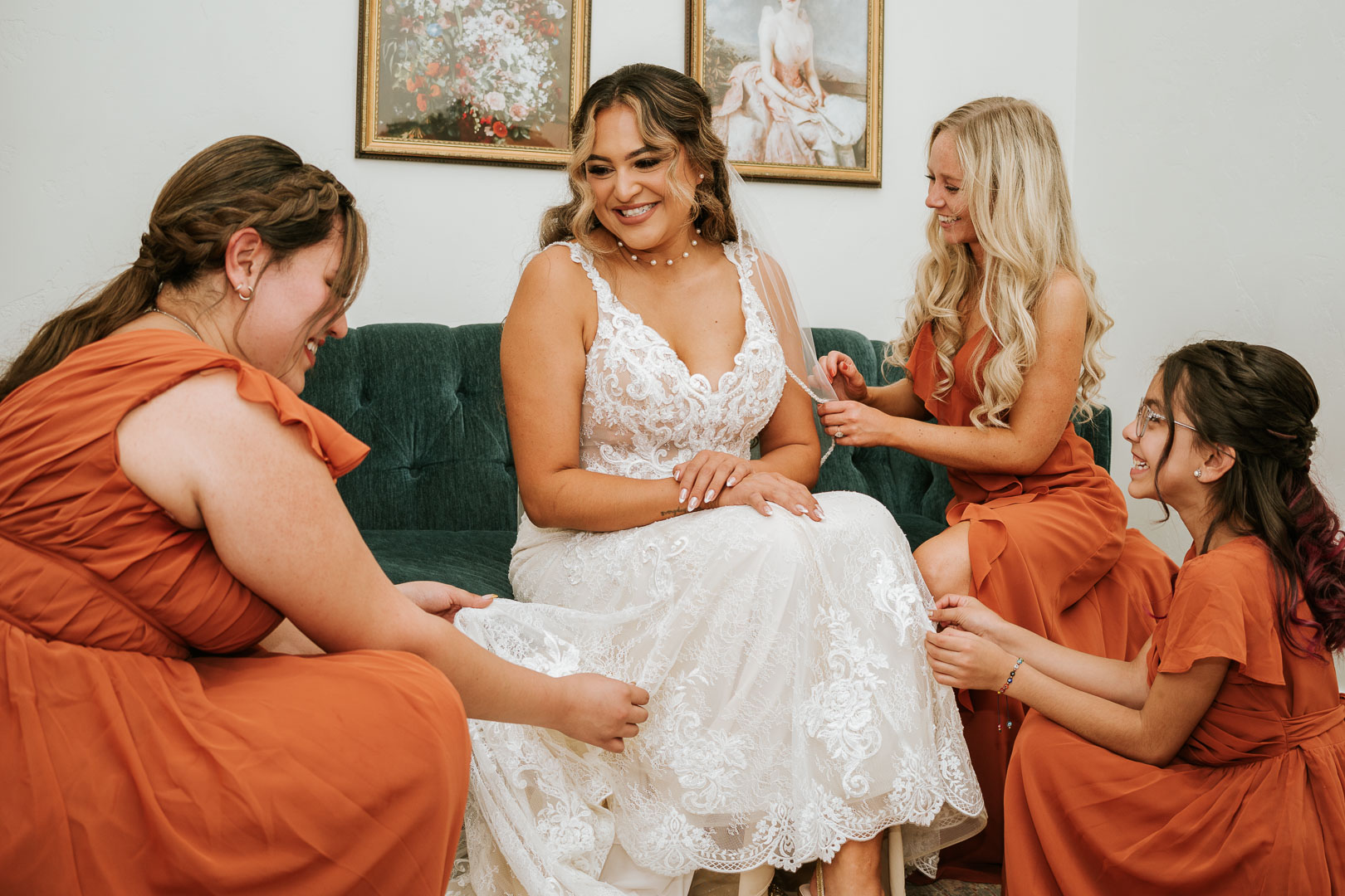 wedding photography portfolio bridesmaids helping bride get ready