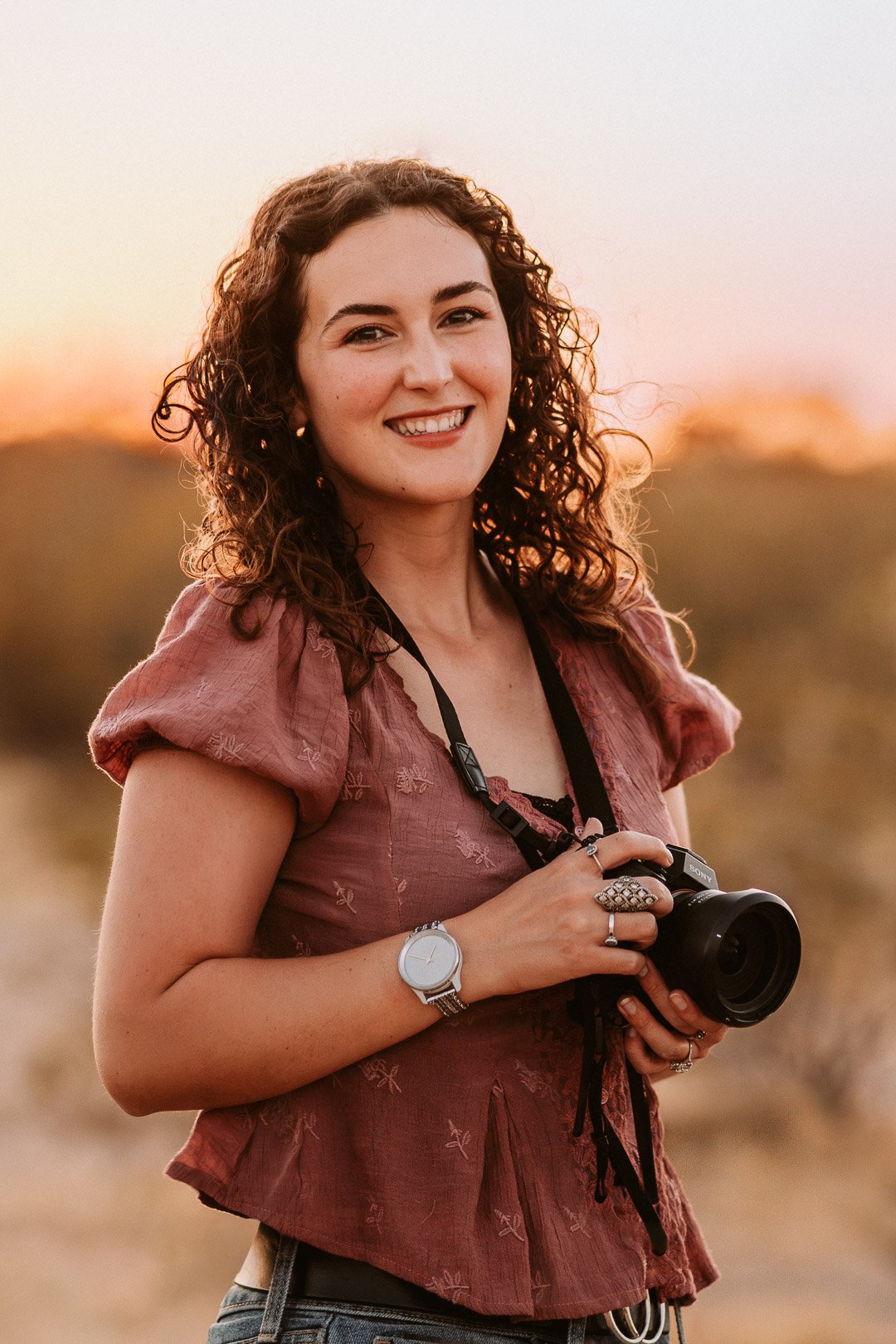 Tucson photographer smiling at camera lashay and light